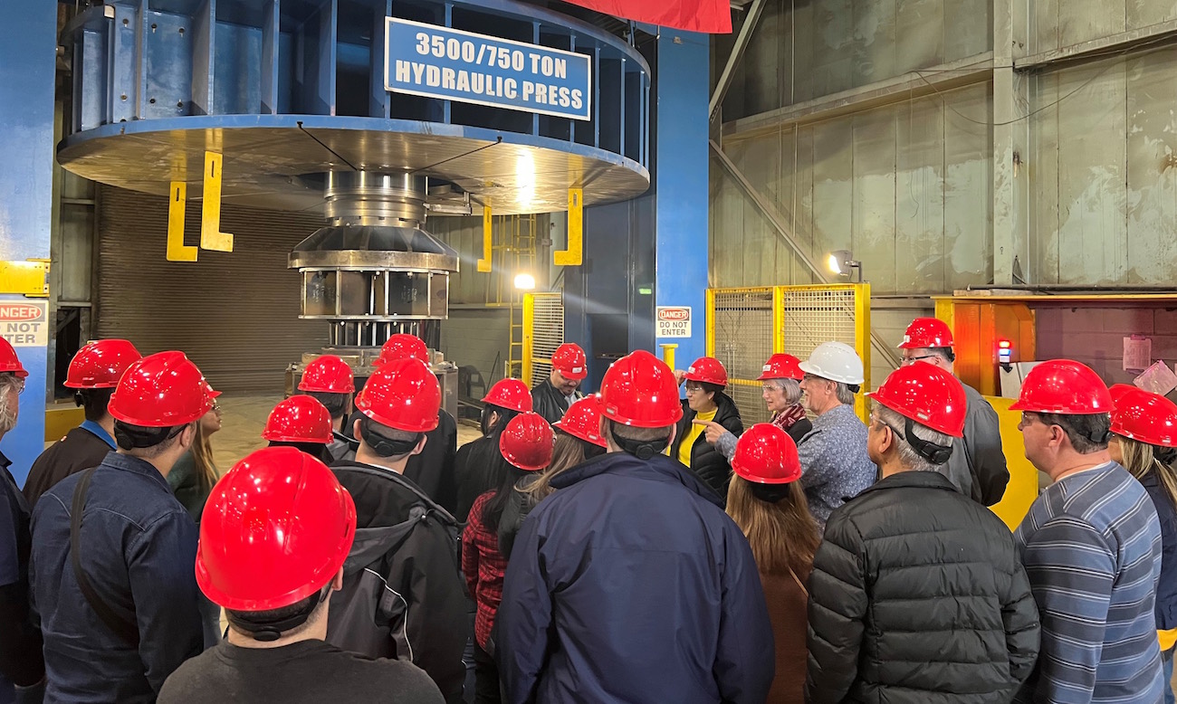 Canerector controllers tour the Conrex Steel facility and its new hydraulic press.